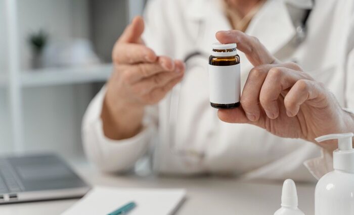 Homeopathy doctor prescribing medicine at the best homeopathy health center in Ghaziabad.